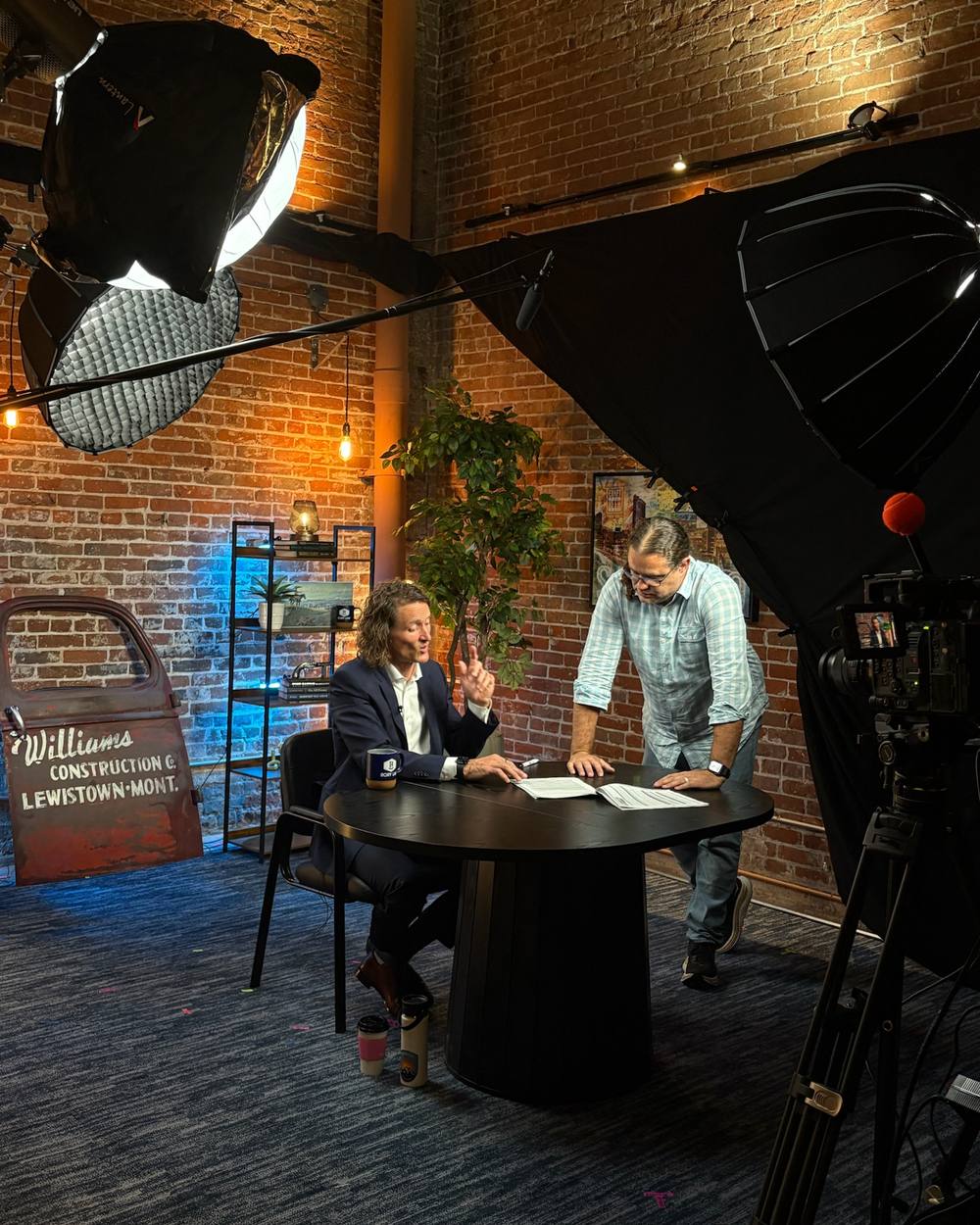 Interview on the brick set with softboxes overhead